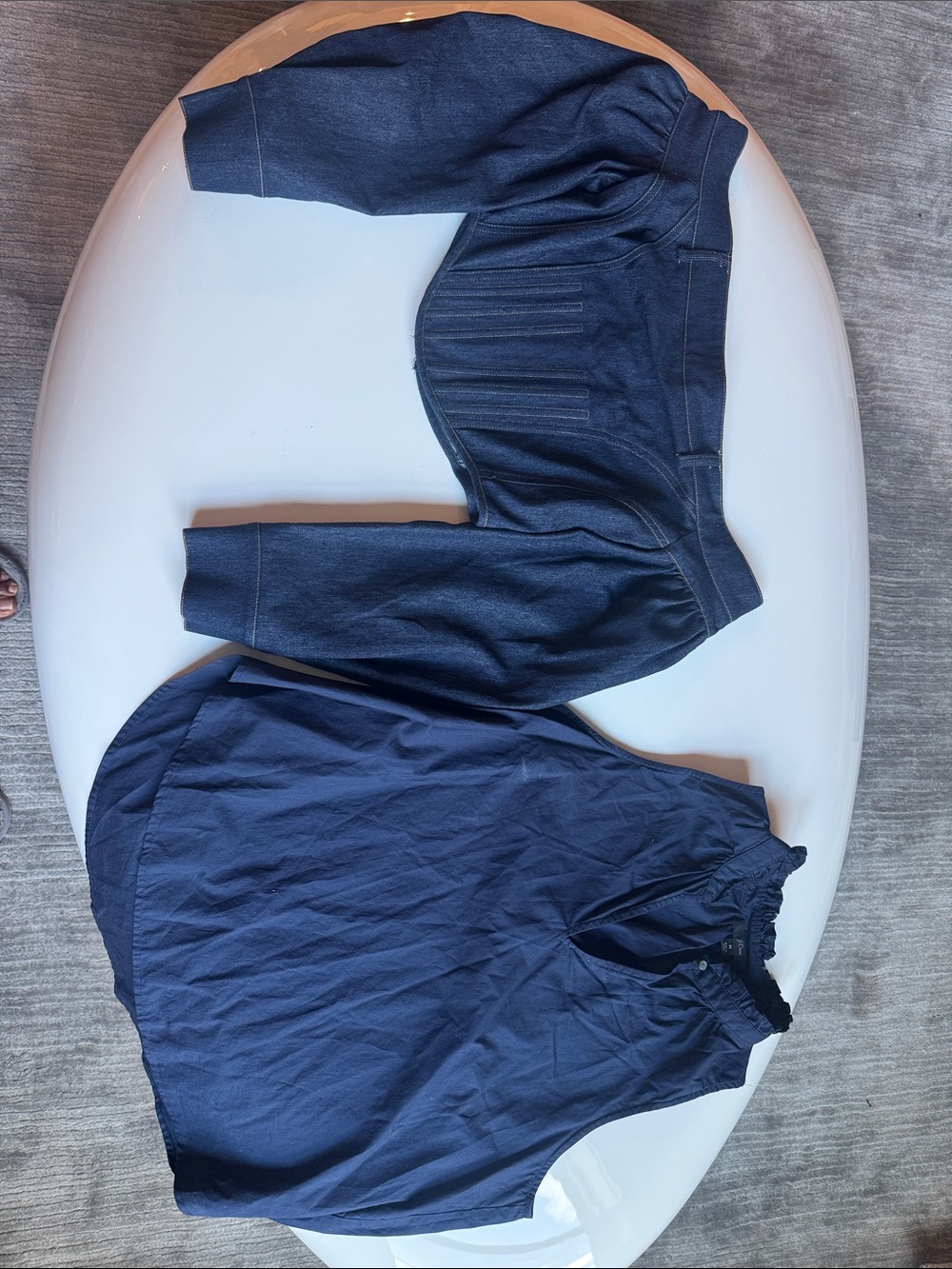 1) Navy denim cropped top. 
2) Navy sleeveless shell top with buttoned neck and